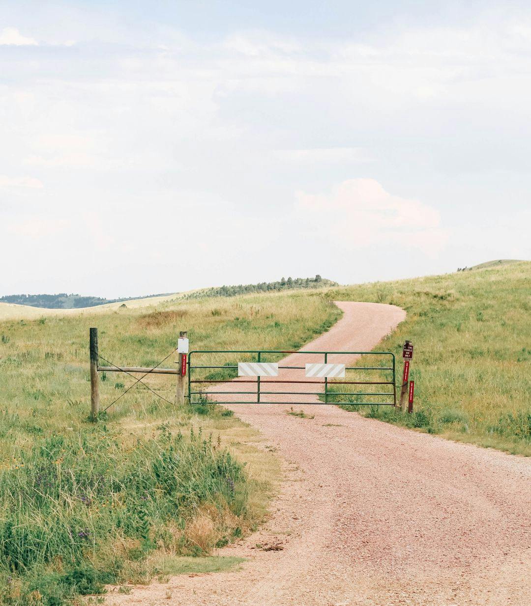 A gate on a dirt road in Fargo