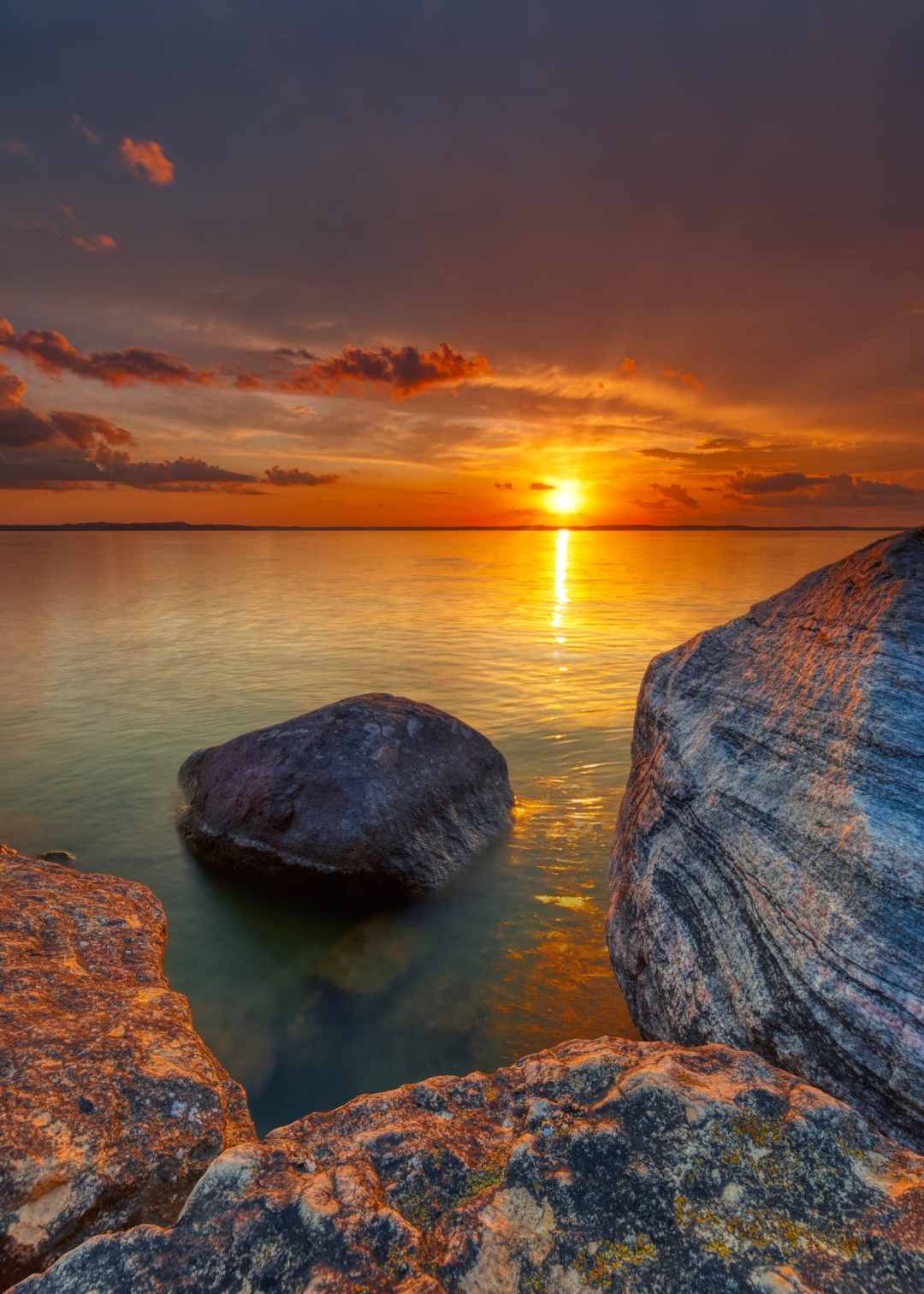 A sunset over water in Madison