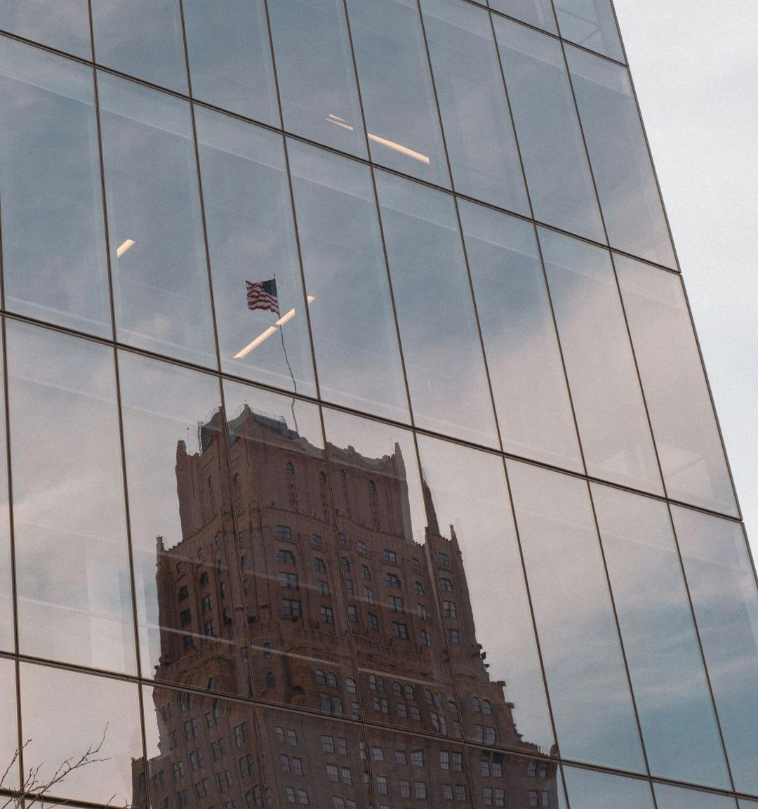 A reflection of a building on another in Newark NJ